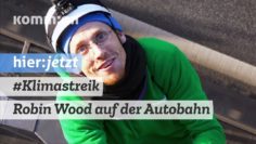 Robin Wood-Kletterer stören Verkehr auf der Autobahn A100 in Berlin